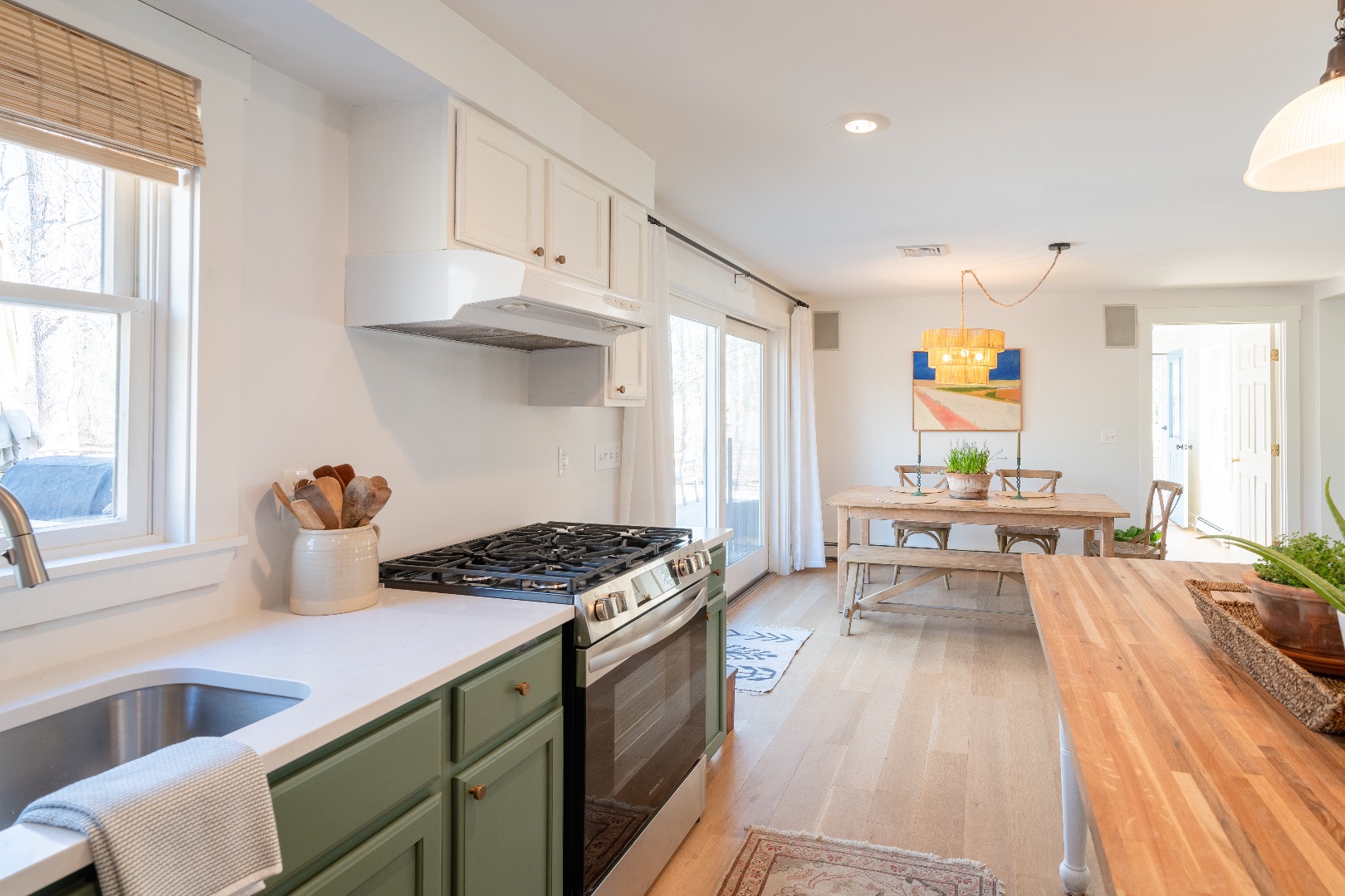 93 Hvoslef Way Vineyard Haven, MA 02568 - Photo 10 of 41 a kitchen with a sink stove and wooden floor