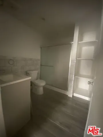 a close view of a utility room with a washer and dryer