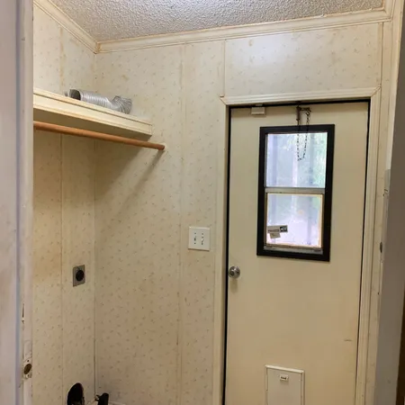 a view of a room with fan