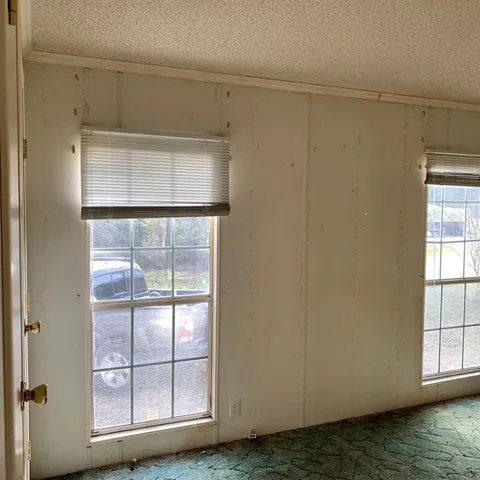 a view of a glass door with shower