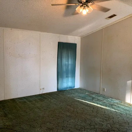 a view of livingroom with an empty space