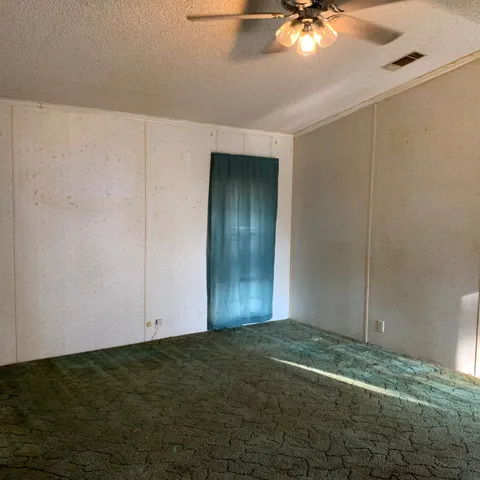 a view of livingroom with an empty space