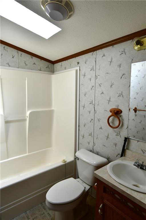 604 Deana Way Rochester, PA 15074 - Photo 6 of 22 a bathroom with a sink mirror vanity and toilet