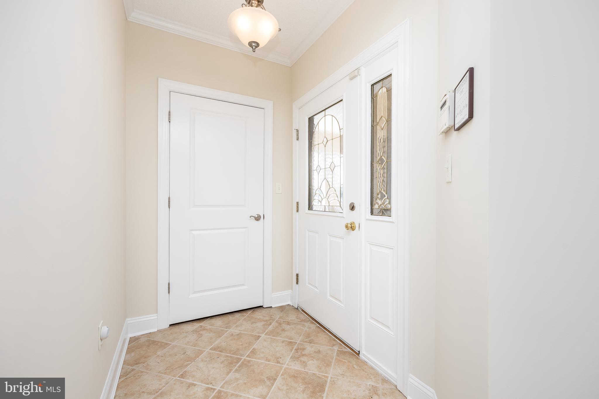 530 Riverside Drive, Unit 202 Salisbury, MD 21801 - Photo 38 of 61 a view of an entryway with wooden floor