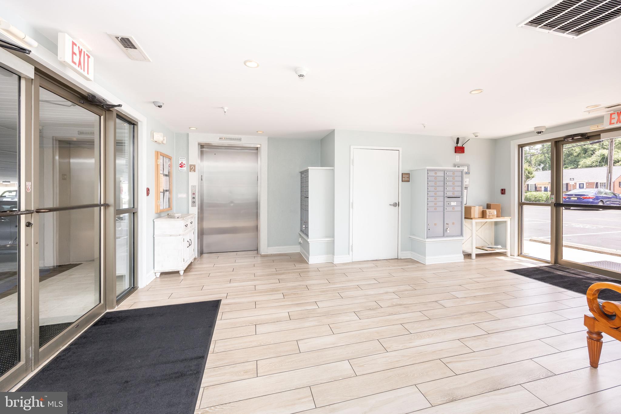 530 Riverside Drive, Unit 202 Salisbury, MD 21801 - Photo 50 of 61 a view of a livingroom with wooden floor and a refrigerator