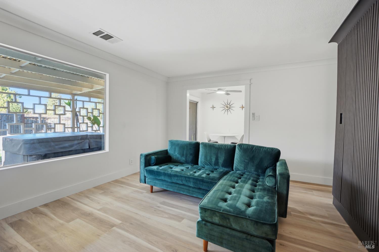823 Shell Avenue Martinez, CA 94553 - Photo 11 of 39 a living room with furniture and a large window