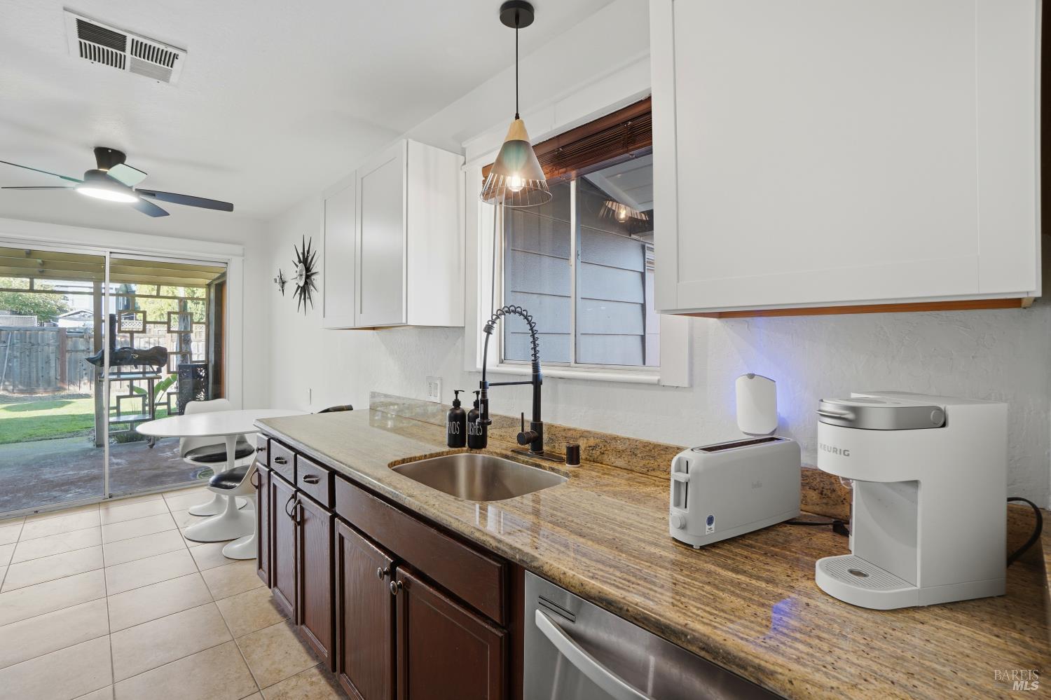 823 Shell Avenue Martinez, CA 94553 - Photo 17 of 39 a kitchen with sink and cabinets