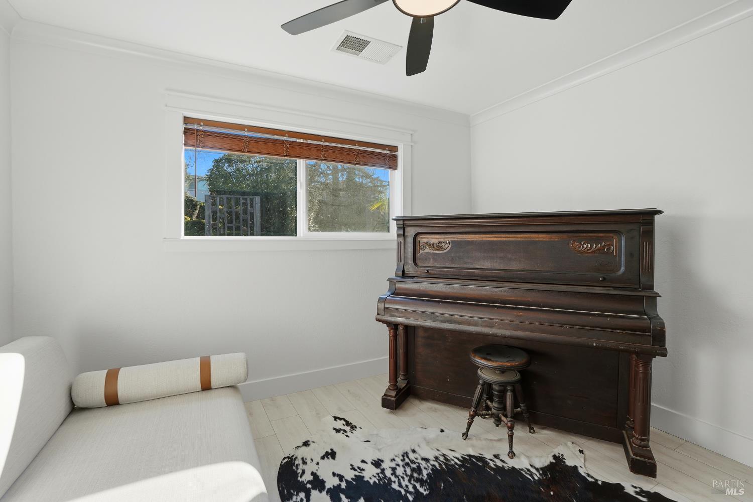 823 Shell Avenue Martinez, CA 94553 - Photo 23 of 39 a bedroom with a bed and a piano