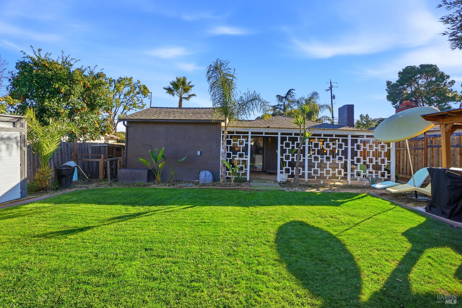 823 Shell Avenue Martinez, CA 94553 - Photo 29 of 39 a view of a house with backyard and a sitting area