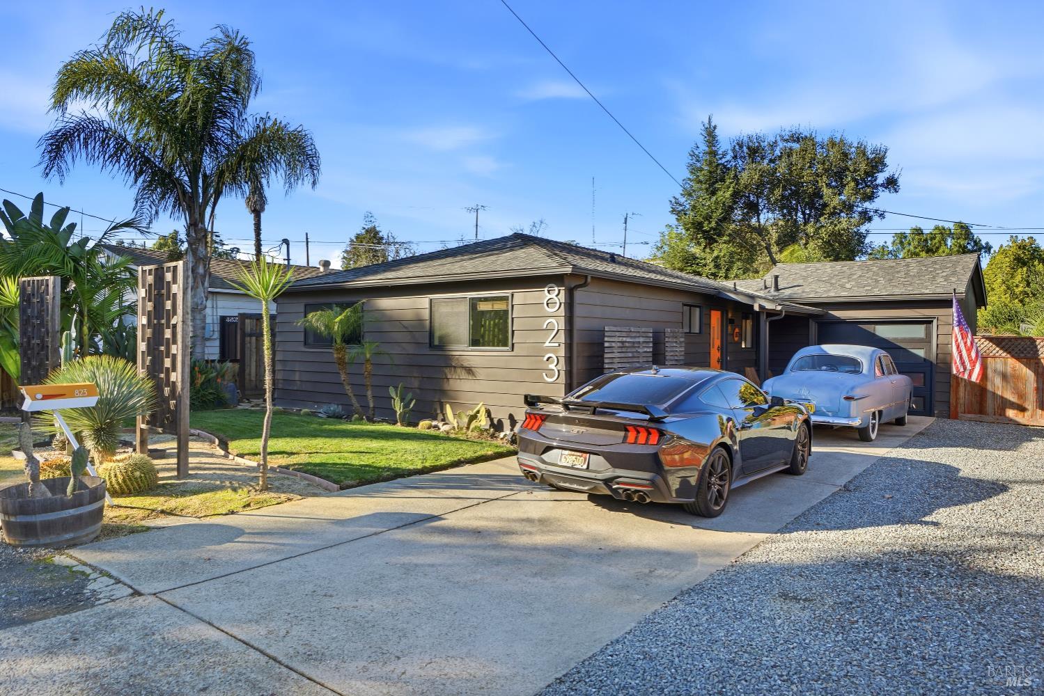 823 Shell Avenue Martinez, CA 94553 - Photo 3 of 39 a house with palm tree in front of it