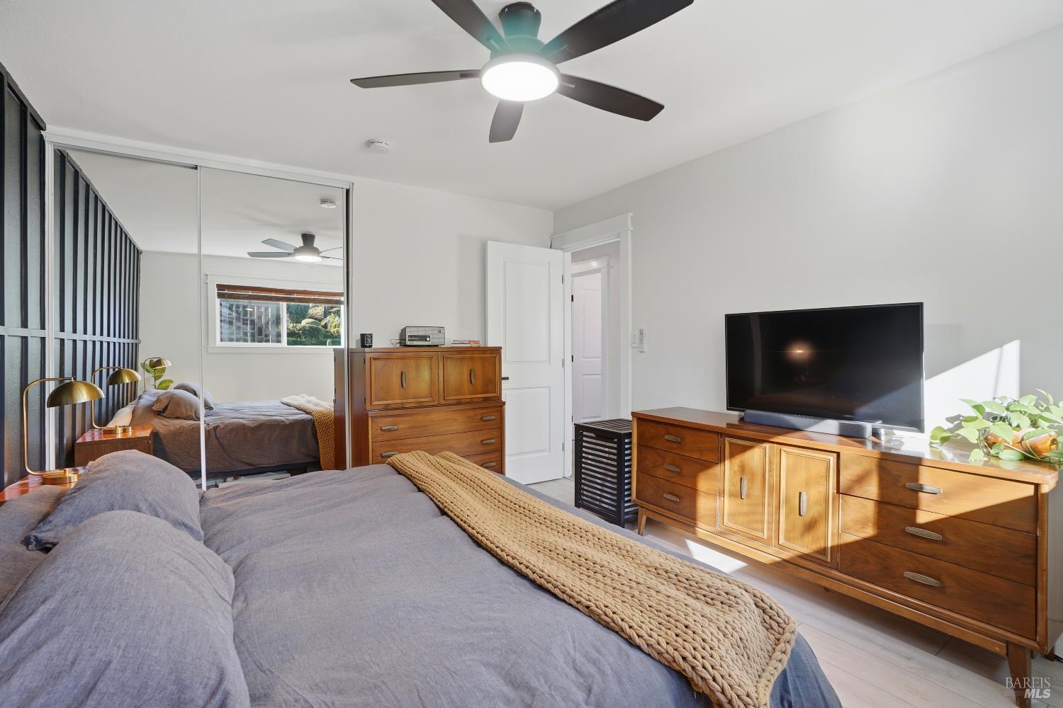 823 Shell Avenue Martinez, CA 94553 - Photo 31 of 39 a bedroom with furniture and a flat screen tv