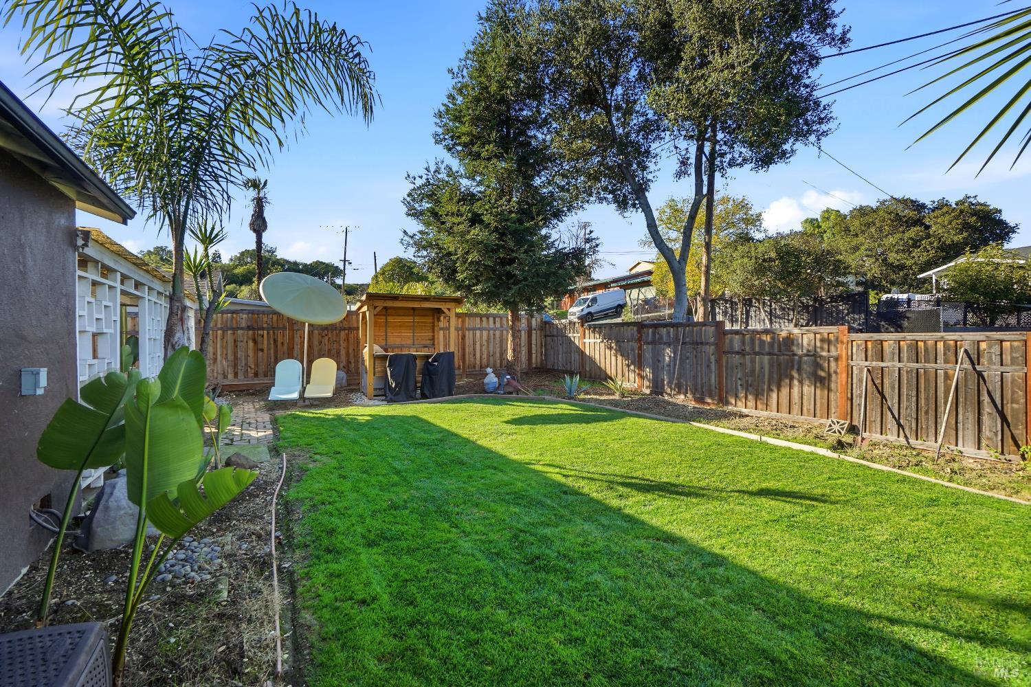 823 Shell Avenue Martinez, CA 94553 - Photo 33 of 39 a view of a house with a yard and a garden