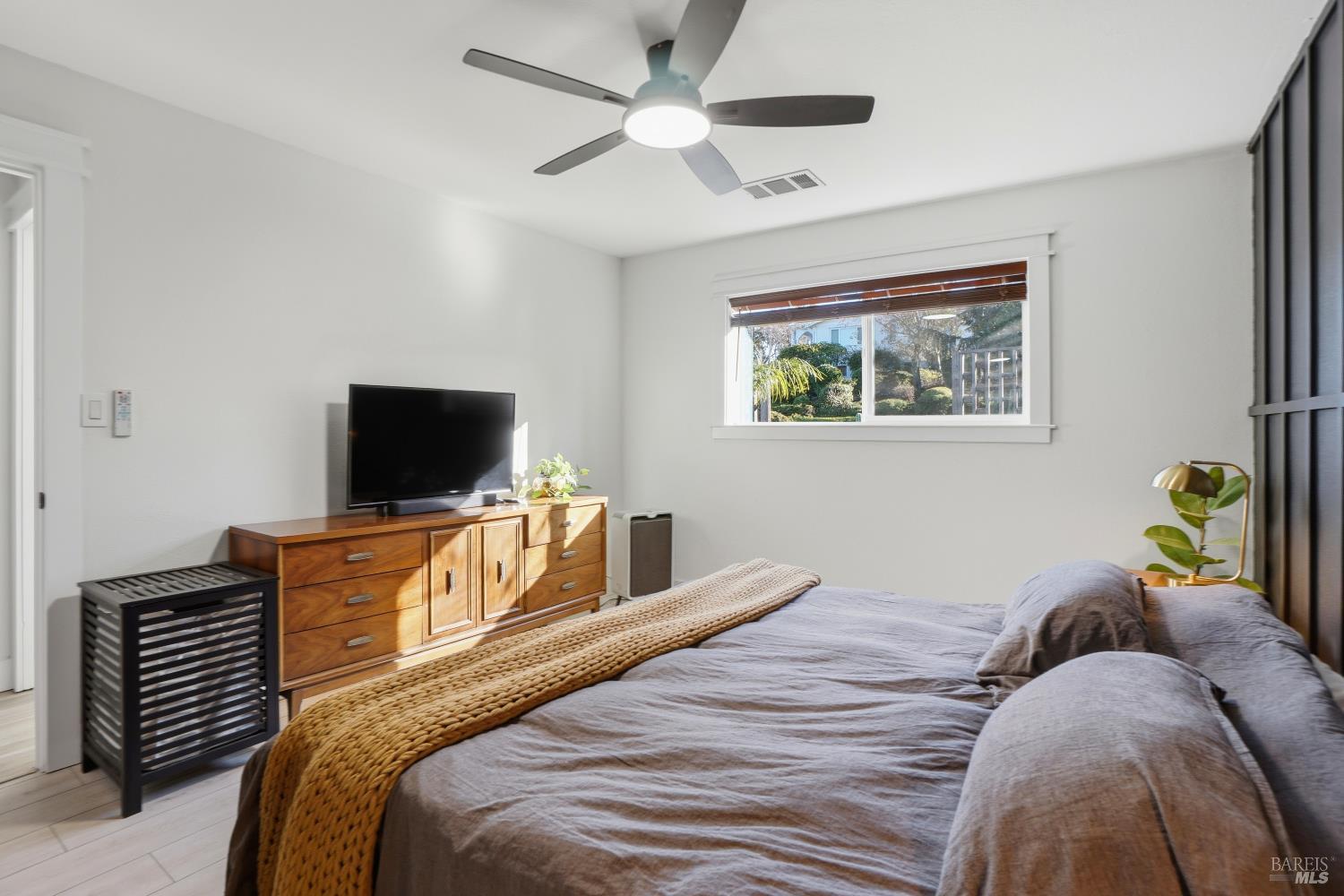 823 Shell Avenue Martinez, CA 94553 - Photo 34 of 39 a bedroom with a bed and a television