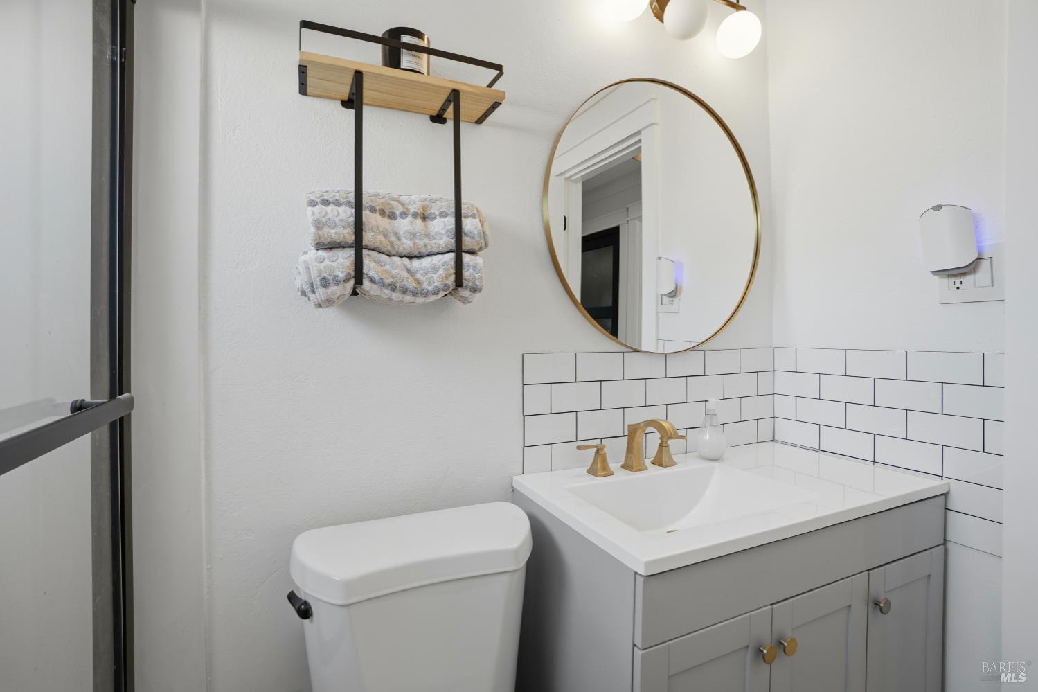 823 Shell Avenue Martinez, CA 94553 - Photo 37 of 39 a bathroom with a sink mirror and toilet