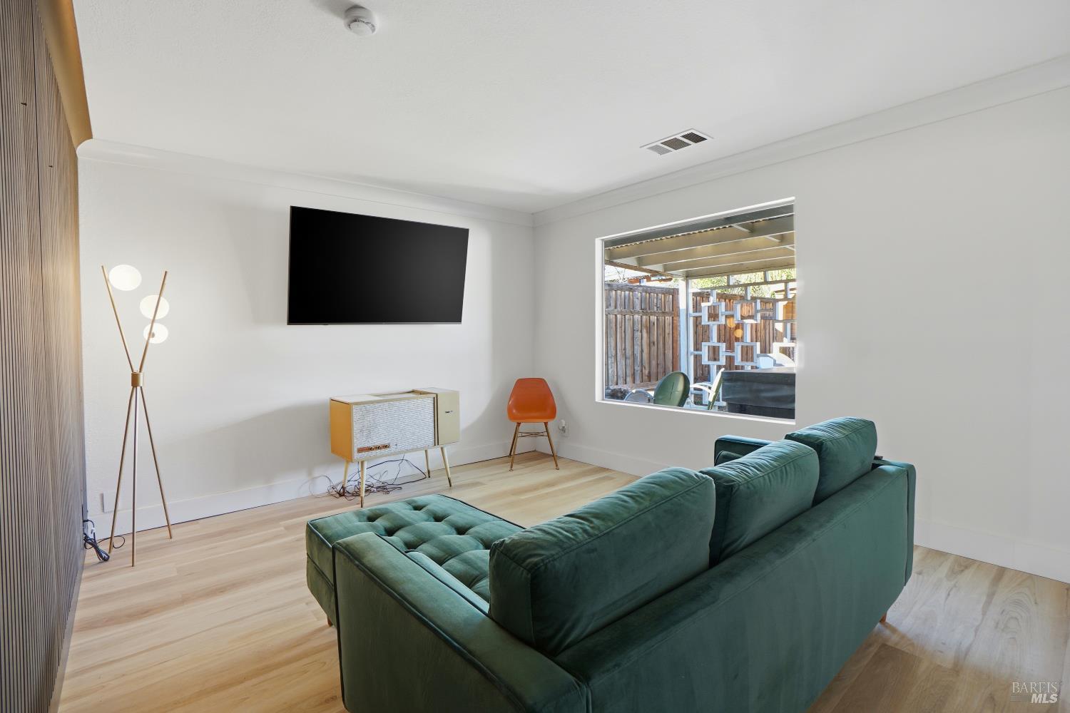 823 Shell Avenue Martinez, CA 94553 - Photo 9 of 39 a living room with furniture and a flat screen tv