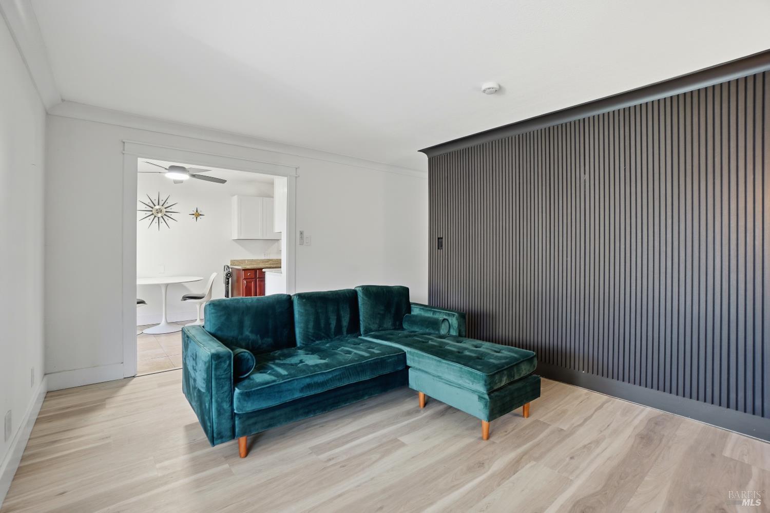 823 Shell Avenue Martinez, CA 94553 - Photo 10 of 39 a living room with furniture and a wooden floor