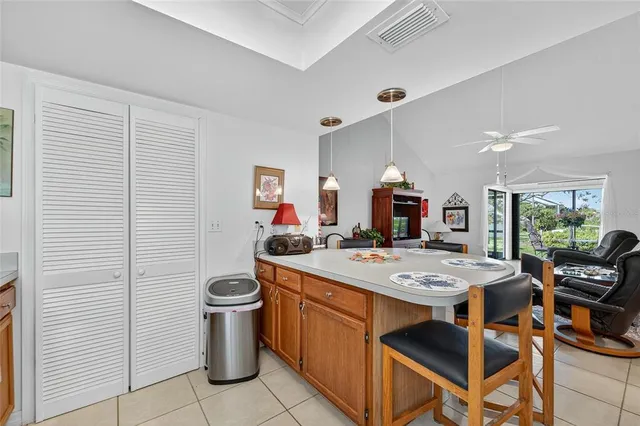 a kitchen with a stove and cabinets