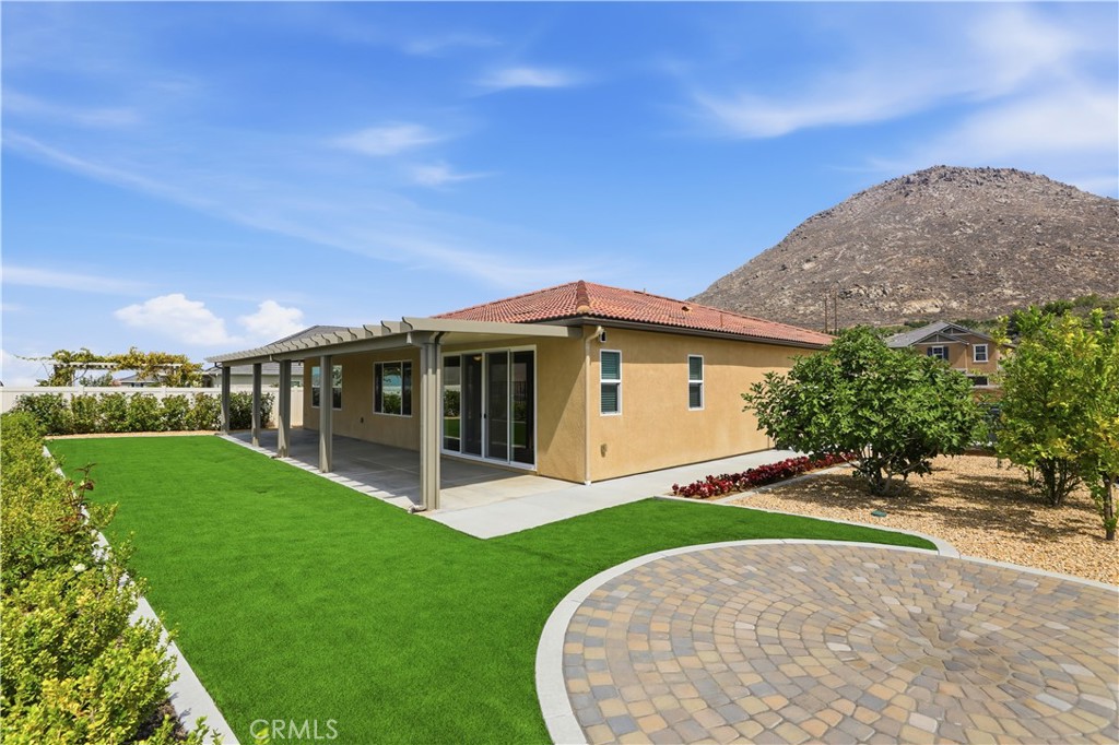 21159 Blue Jeans Court Riverside, CA 92507 - Photo 61 of 63 a view of a house with a big yard