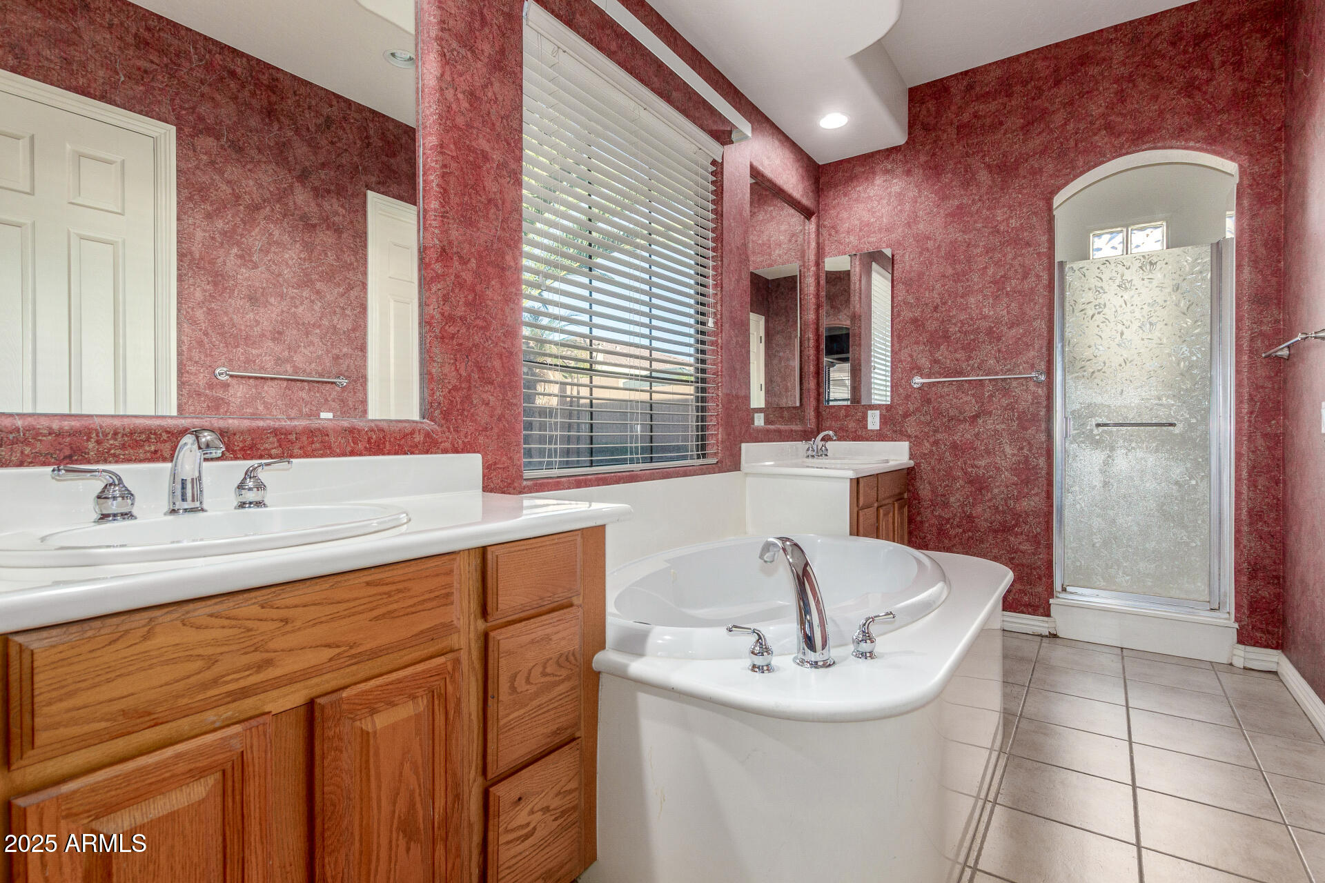 14380 West Monte Vista Road Goodyear, AZ 85395 - Photo 19 of 37 a bathroom with a sink and a bathtub