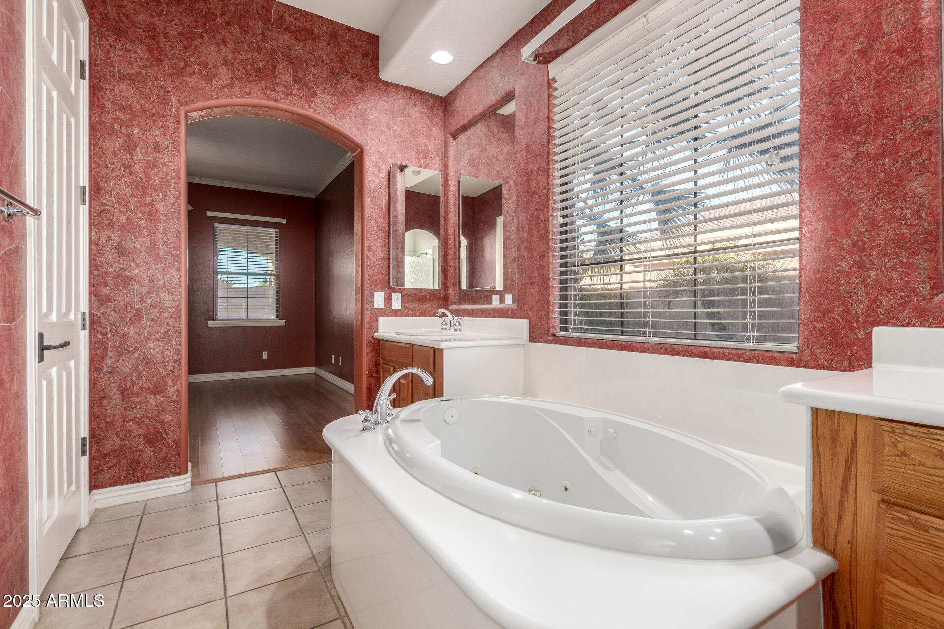 14380 West Monte Vista Road Goodyear, AZ 85395 - Photo 20 of 37 a bathroom with a bathtub and a sink