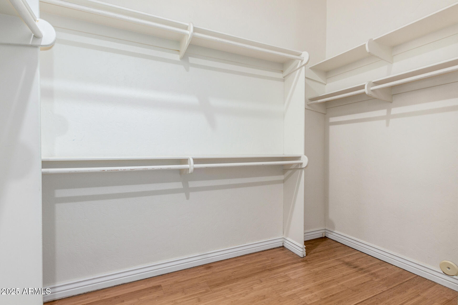 14380 West Monte Vista Road Goodyear, AZ 85395 - Photo 21 of 37 a view of an empty walk in closet