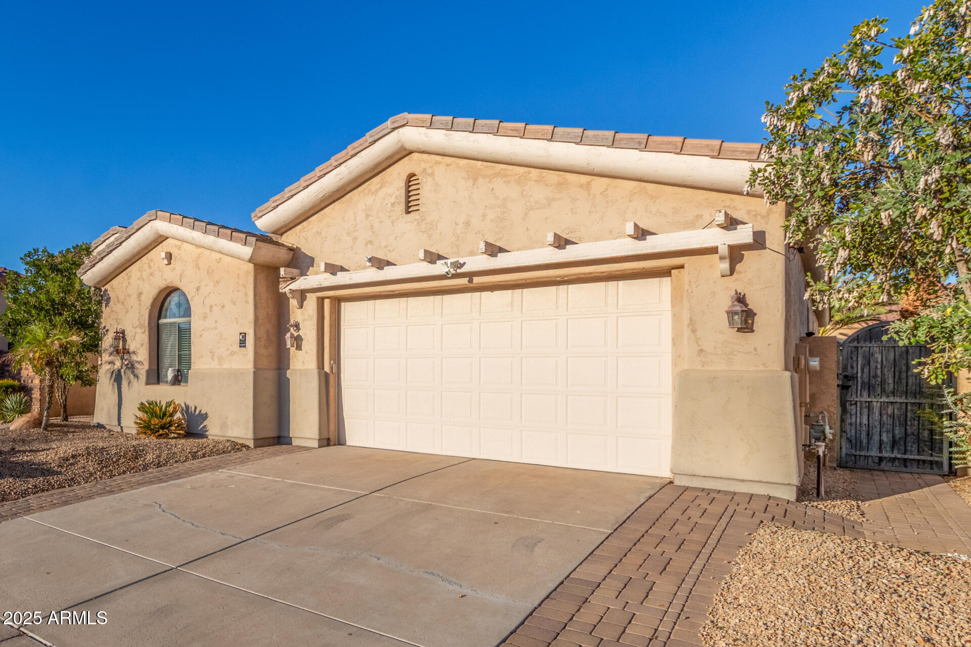 14380 West Monte Vista Road Goodyear, AZ 85395 - Photo 3 of 37 a view of a house with a outdoor space