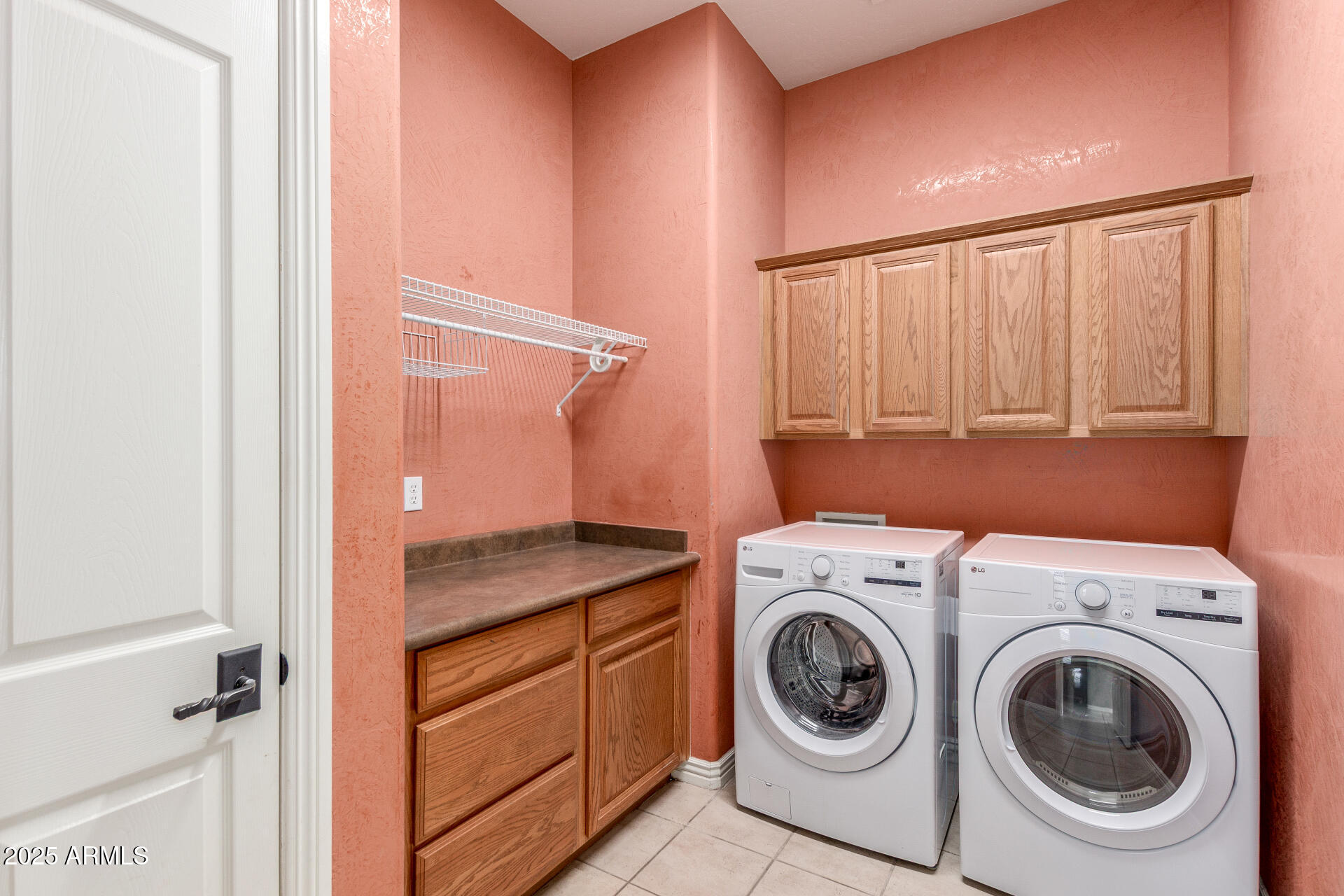 14380 West Monte Vista Road Goodyear, AZ 85395 - Photo 31 of 37 a utility room with dryer and washer