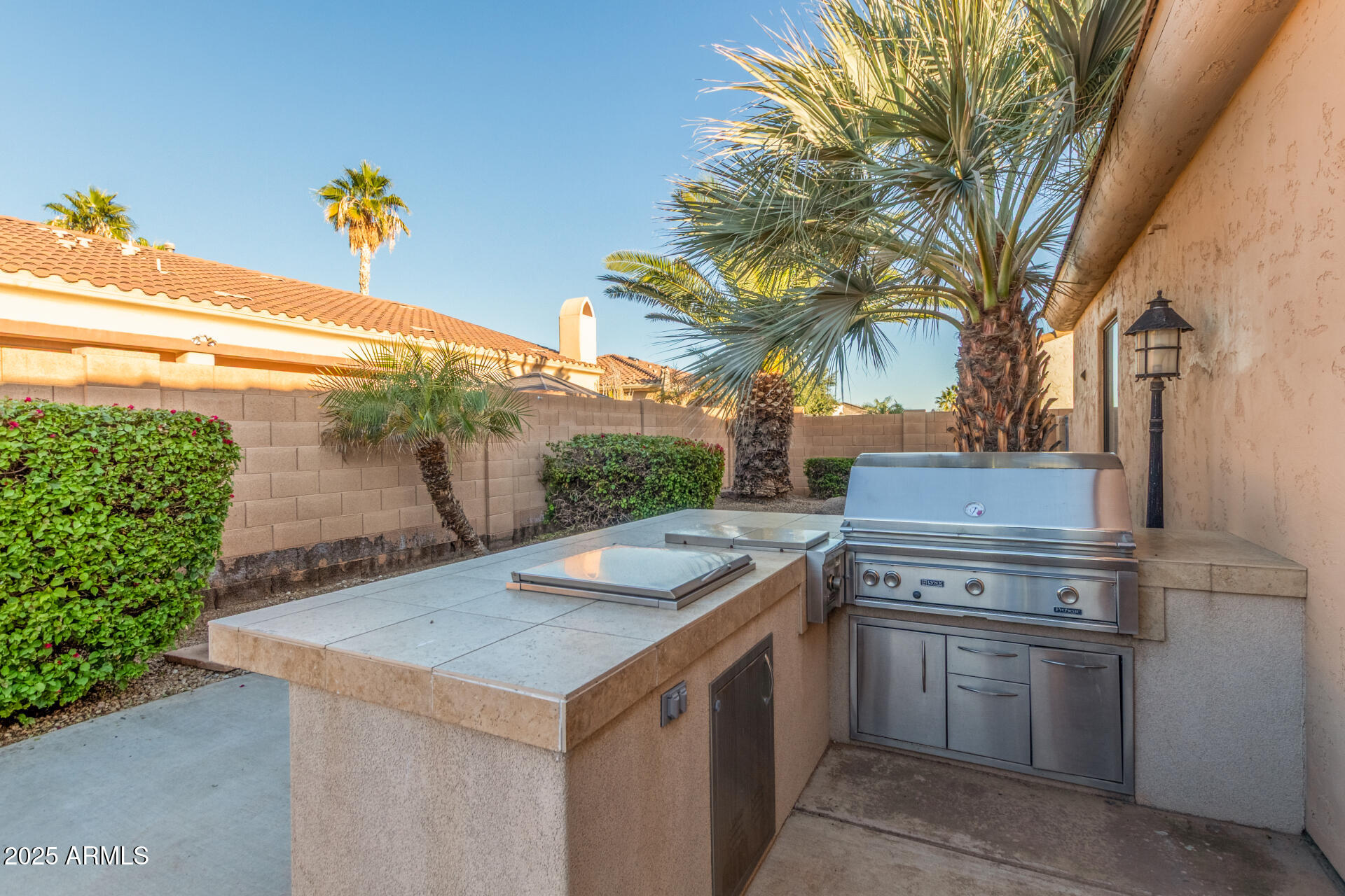 14380 West Monte Vista Road Goodyear, AZ 85395 - Photo 34 of 37 a view of a kitchen with a sink and dishwasher
