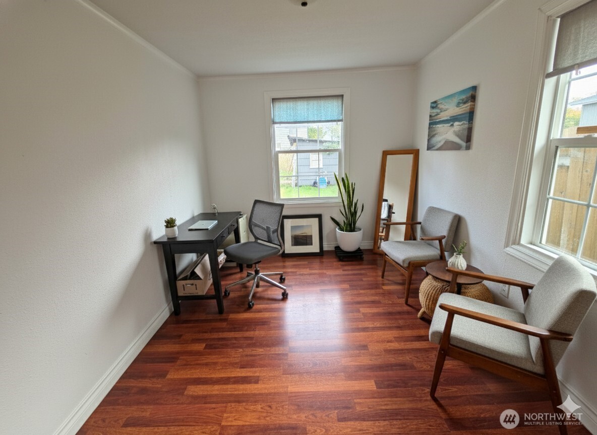 212 Douglas Street Longview, WA 98632 - Photo 16 of 20 a living room with furniture a window and wooden floor