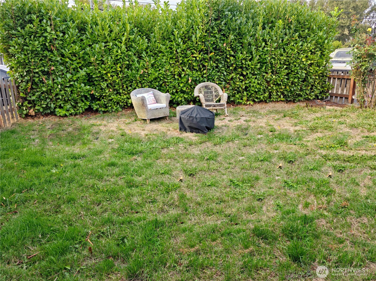 212 Douglas Street Longview, WA 98632 - Photo 19 of 20 a backyard of a house with table and chairs