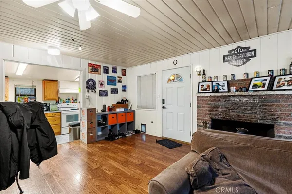 a bed room with furniture and a fireplace