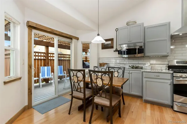 a bedroom with a bed and a table