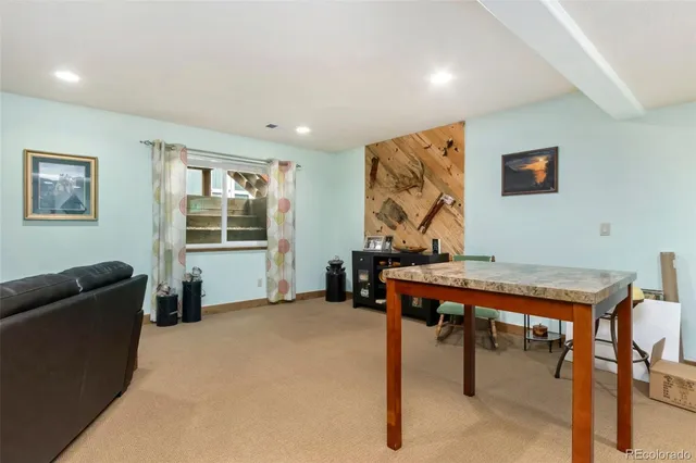 a living room with furniture and a couch