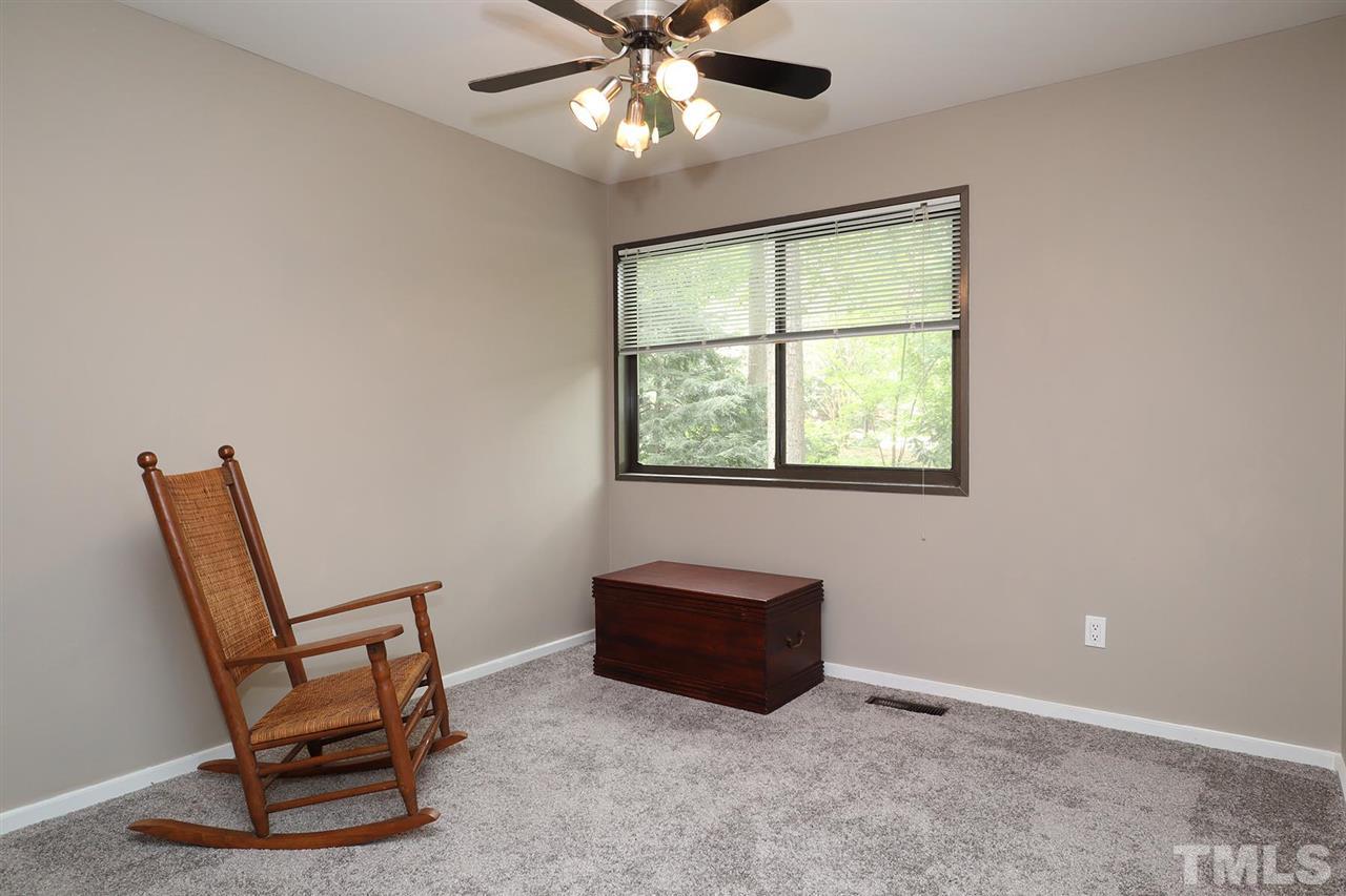 4613 Oak Park Road Raleigh, NC 27612 - Photo 15 of 25 a view of workspace with furniture and a window