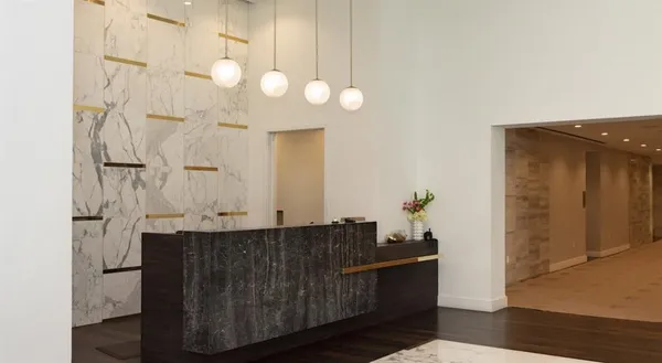 a room with cabinets and wooden floor