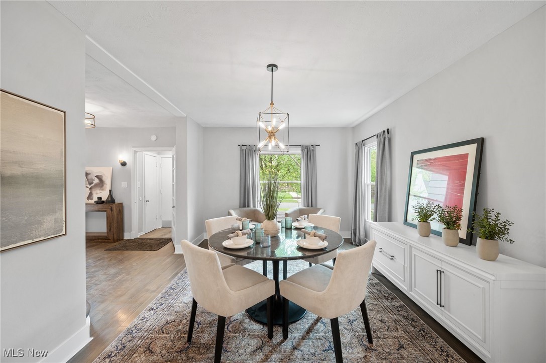 3045 Scarborough Road Cleveland, OH 44118 - Photo 15 of 42 Dining room with baseboards and dark wood finished floors