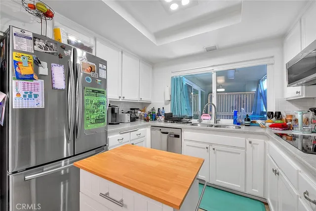 a bathroom with a sink a vanity and a mirror