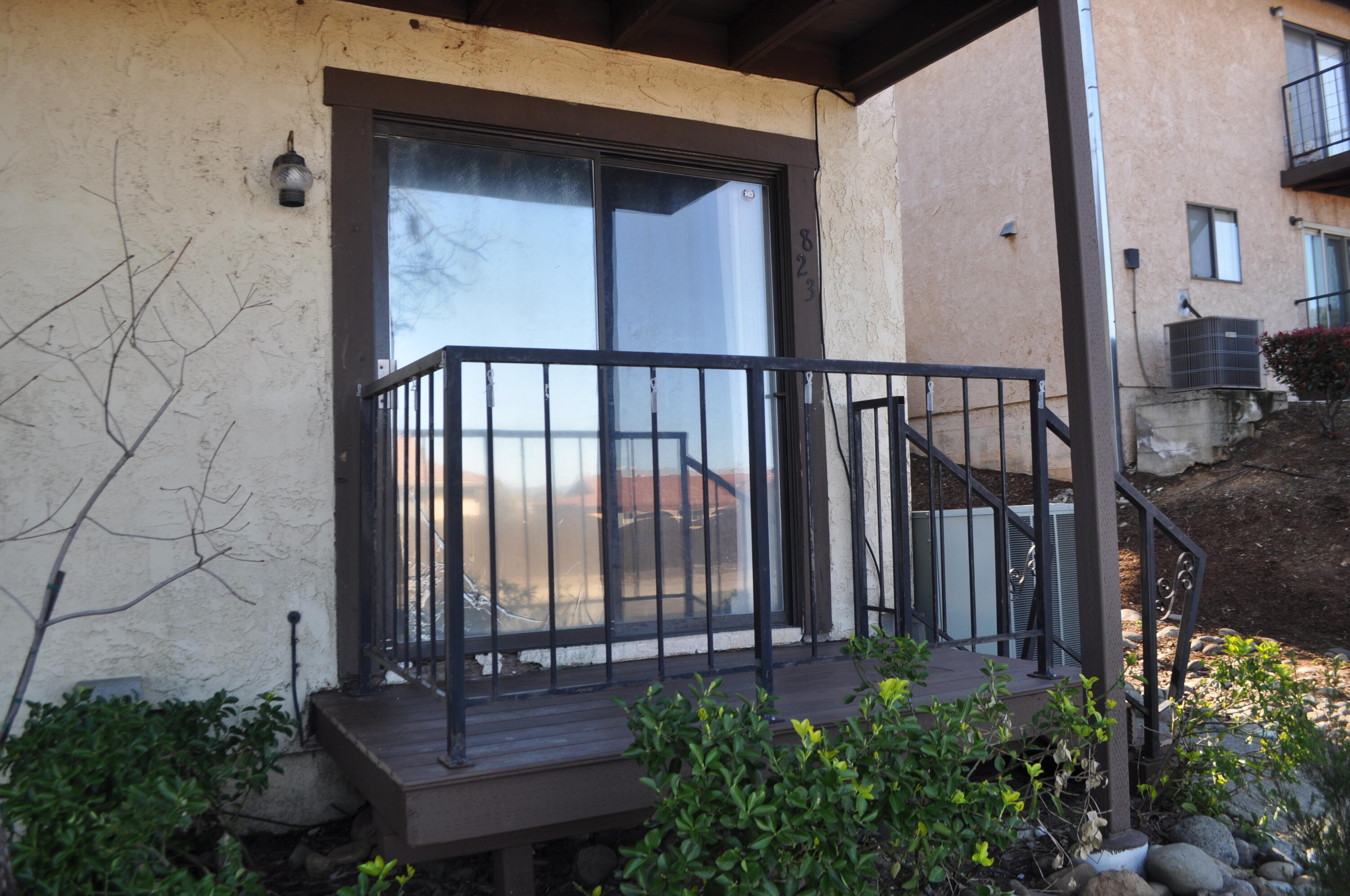 823 Mission Sierra Court Redding, CA 96003 - Photo 14 of 18 a view of a porch with a bench
