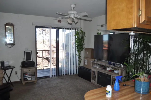 a kitchen with stainless steel appliances granite countertop a stove and a refrigerator