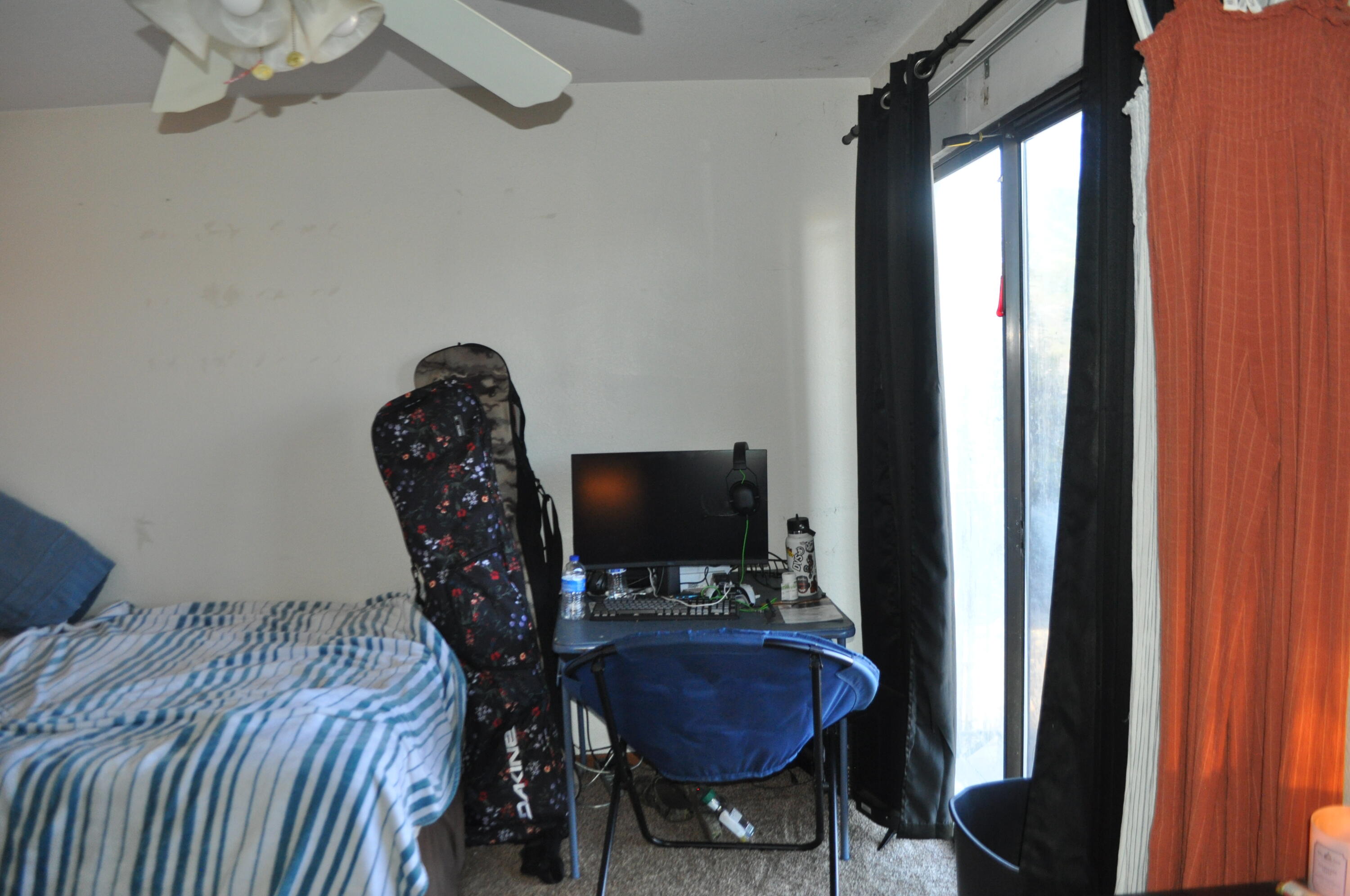 823 Mission Sierra Court Redding, CA 96003 - Photo 8 of 18 a bed room with furniture and a window