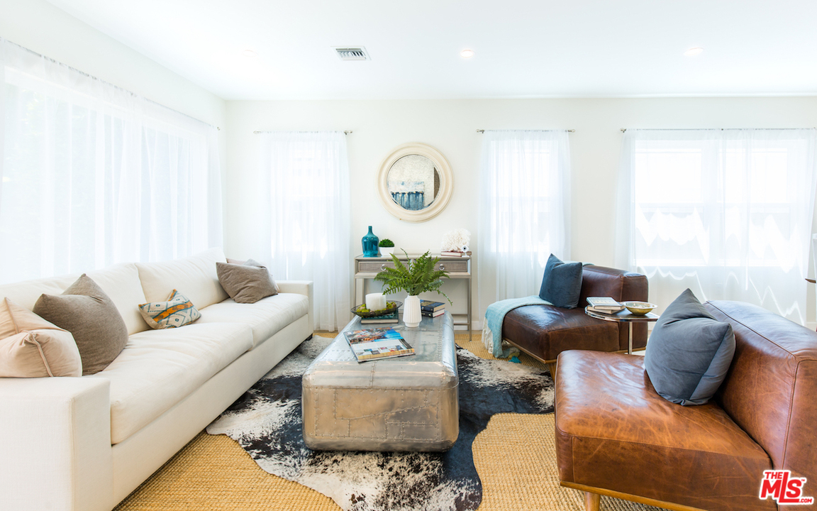 905 Lucille Avenue Venice, CA 90291 - Photo 3 of 24 a living room with furniture and a window