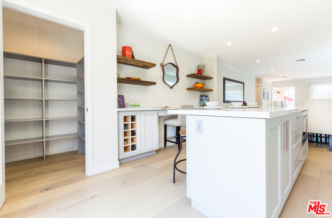 905 Lucille Avenue Venice, CA 90291 - Photo 9 of 24 a view of kitchen with cabinets and wooden floor