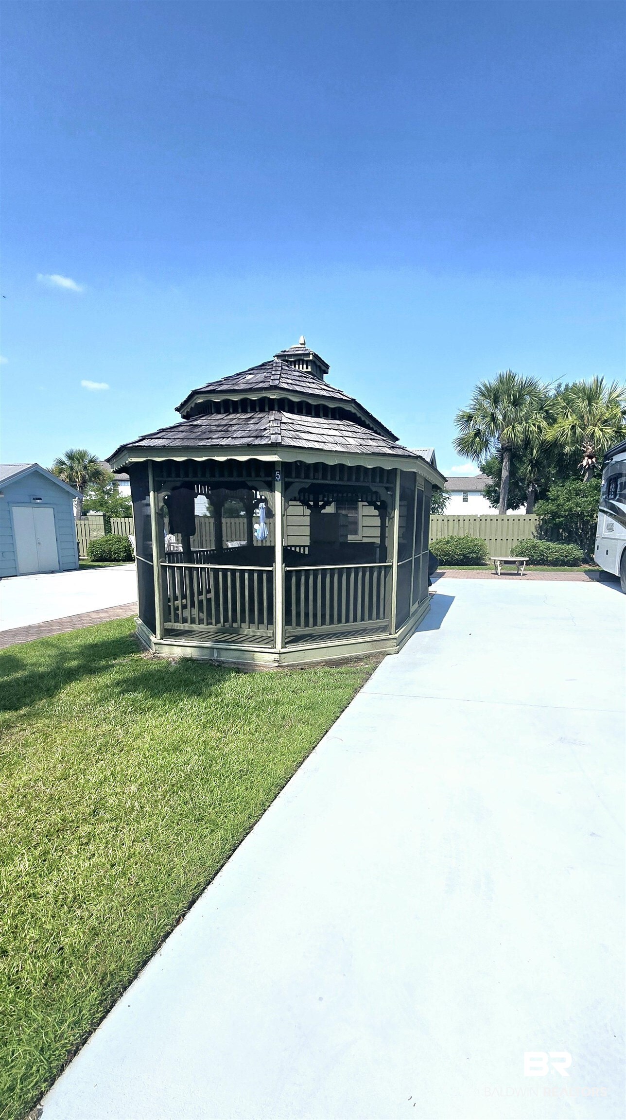 4650 Griffith Marina Road, Unit 5A Orange Beach, AL 36561 - Photo 4 of 13 View of front facade featuring a gazebo