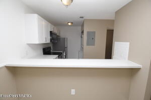 1021 Abada Court Northeast, Unit 102 Palm Bay, FL 32905 - Photo 9 of 16 a view of kitchen