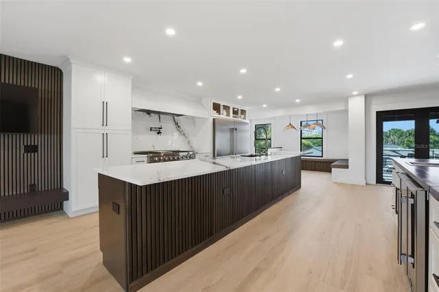 a view of a kitchen with a sink and a window
