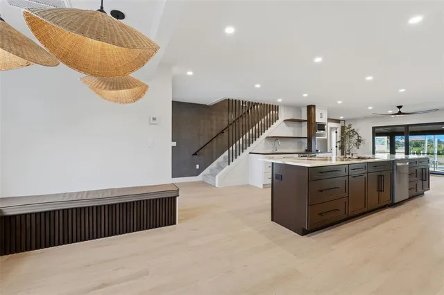 a view of outdoor space with wooden floor and windows