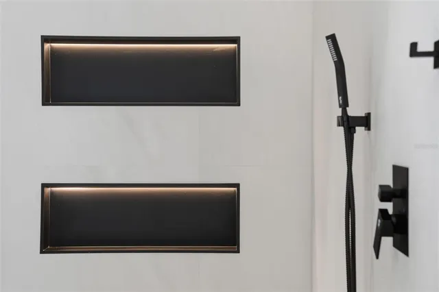 a spacious bathroom with a double vanity sink and a mirror