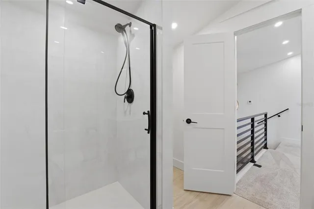 an aerial view of a house with a ocean view