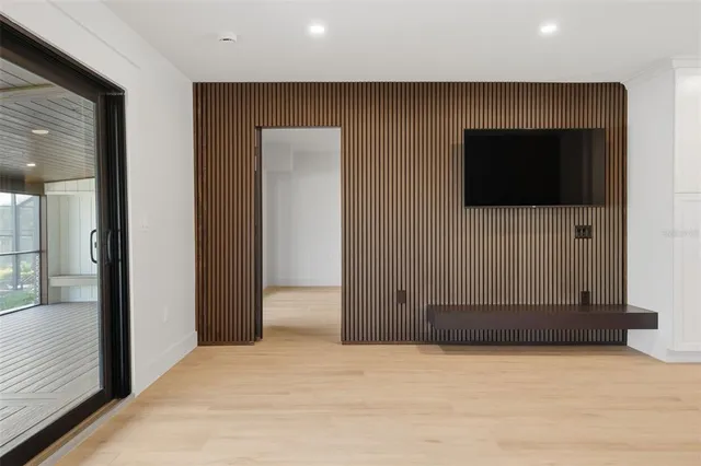 a kitchen with granite countertop a sink stove and cabinets