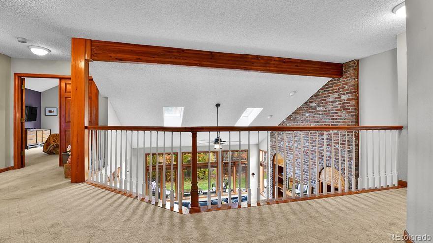 4852 South Carson Street Aurora, CO 80015 - Photo 23 of 48 a view of a hallway